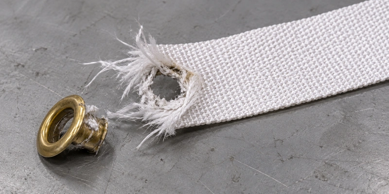 eyelet pull through failure in woven strap